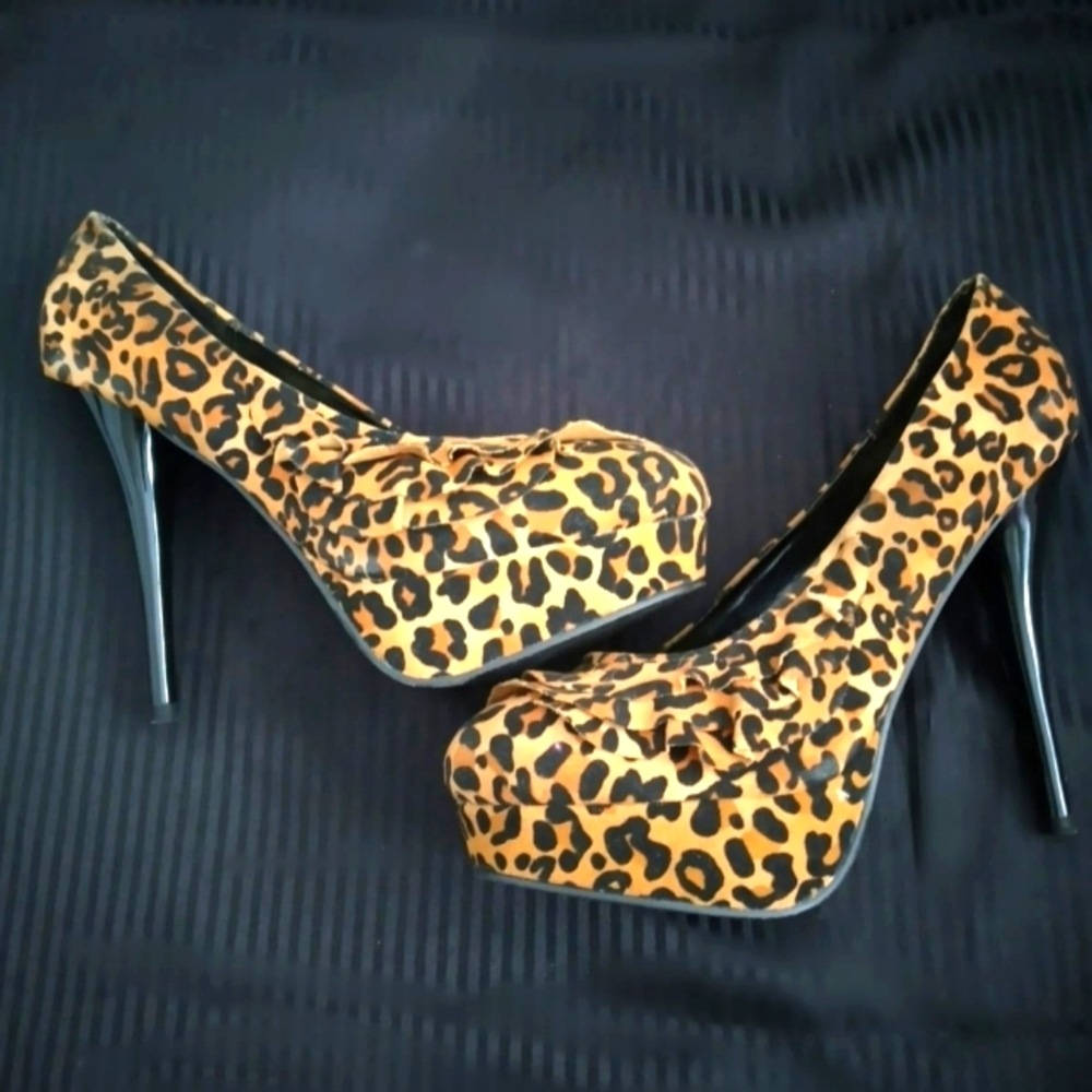 Leopard print shoes. Feels like suede. Platform bottom high heel